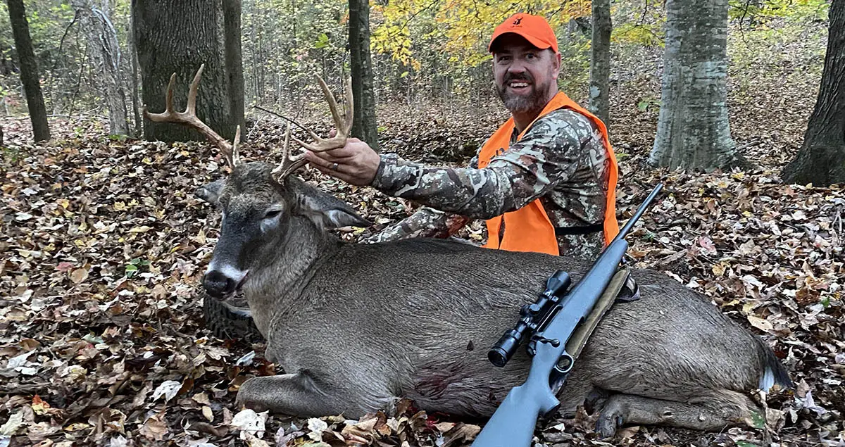 The author with a nice buck taken on his property in Georgia.