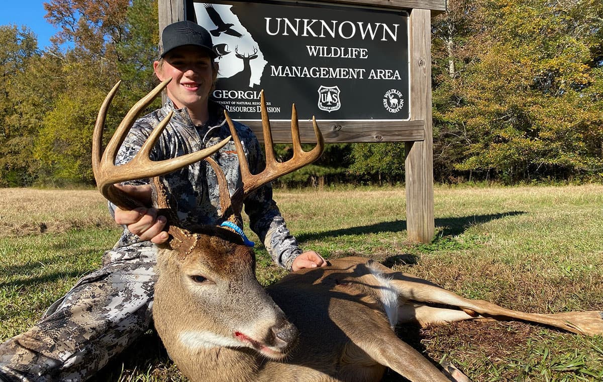 Young hunter with a nice public land buck.